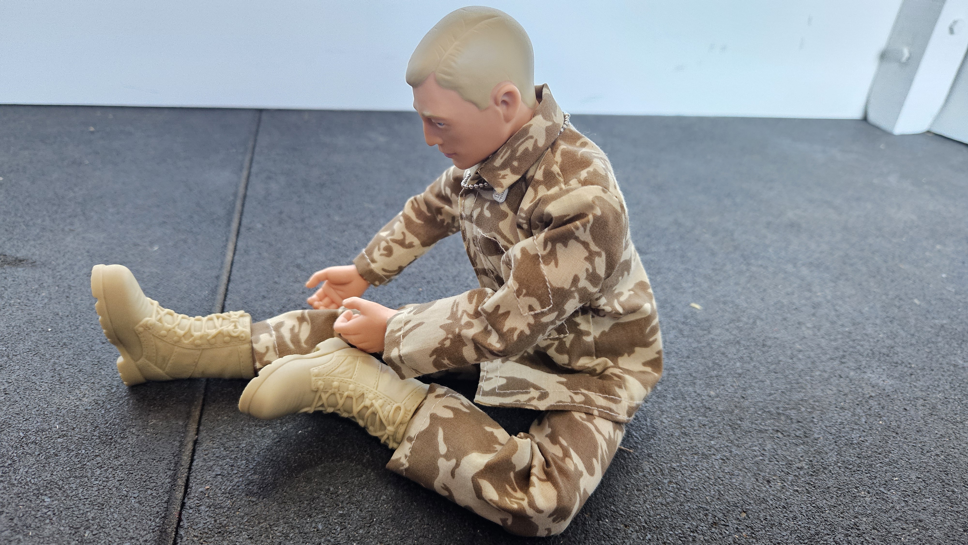 Action Man doing Head To Knee Pose